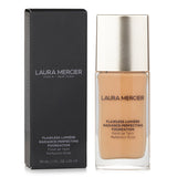 Laura Mercier Flawless Lumiere Foundation in #2W1 Macadamia for a radiant, weightless coverage with hydration and luminosity.