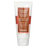 Luxurious Sisley body cream with SPF 30, offering high UVA protection and hydration with a fragrant, water-resistant formula.