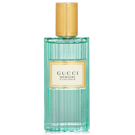 Elegant Gucci Memoire D'une Odeur Eau De Parfum in vintage bottle, blending fresh and sweet notes for all genders.