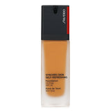 Shiseido Synchro Skin Foundation SPF 30 in #420 Bronze, offering lightweight, buildable coverage and all-day hydration.