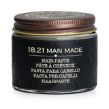 Luxurious 18.21 Man Made Paste in Sweet Tobacco, offering medium hold and satin finish for versatile men's hairstyles.