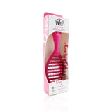 Vibrant pink Wet Brush Speed Dry Detangler features heat-resistant bristles for effortless detangling while blow-drying.