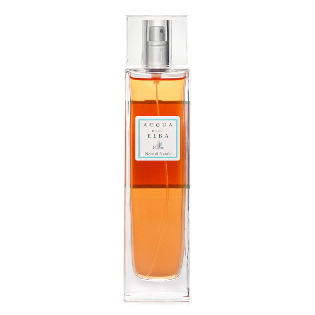 Luxurious Acqua Dell'Elba room spray in Note Di Natale, perfect for infusing festive cheer with warm orange and cinnamon scents.