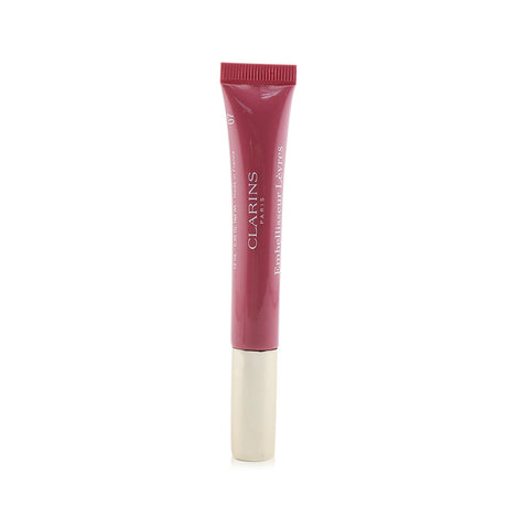 "Clarins Natural Lip Perfector #07 Toffee Pink Shimmer, 12ml, offers shiny, plump lips with nourishing ingredients and a non-sticky formula."