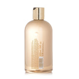 Molton Brown Jasmine & Sun Rose Bath & Shower Gel, a luxurious 300ml gel with floral notes for a refreshing cleanse.