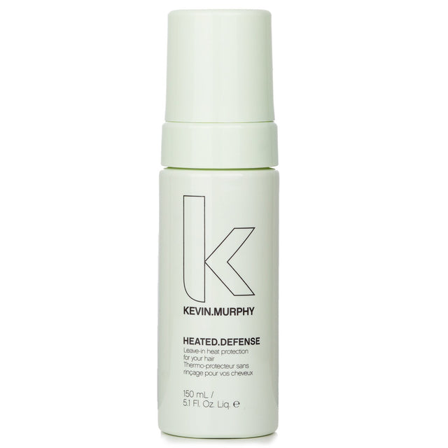 Heat protection spray for all hair types, enriched with quinoa, jojoba, and castor oils for moisture and damage defense.