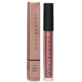 High-shine vegan lip gloss #Nebula, infused with nourishing oils for a glossy, non-sticky finish and a playful shimmer.