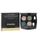 Chanel Les 4 Ombres Quadra Eye Shadow in No. 324 Blurry Blue features four versatile shades in a chic mirrored compact.