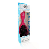 Vibrant pink Wet Brush Original Detangler, featuring ultra-soft bristles for gentle, pain-free detangling of all hair types.