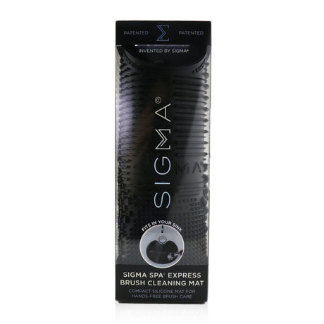 Sigma Beauty Spa Express Brush Cleaning Mat in black with seven textures, suction cups, and compact design for effective brush cleaning.