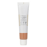 A bottle of Sisley Phyto Hydra Teint Tinted Moisturizer SPF 15 in #2 Medium, promoting glowing skin with sun protection.