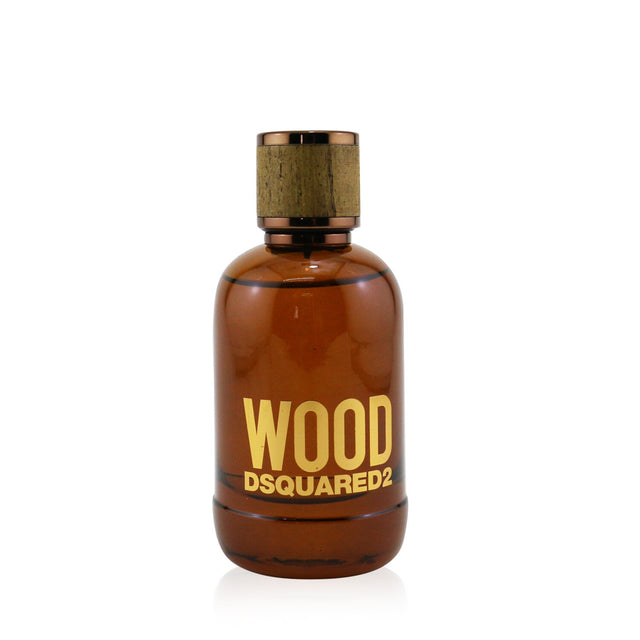 Bottle of Dsquared2 Wood Pour Homme Eau De Toilette, a floral woody scent for men with fresh citrus and warm earthy notes.