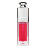 Luscious cherry-infused lip oil offering glossy shine, hydration, and personalized color for radiant lips.