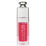 Christian Dior Dior Addict Lip Glow Oil in #015 Cherry, a nourishing, glossy lip oil with a non-sticky cherry infusion.