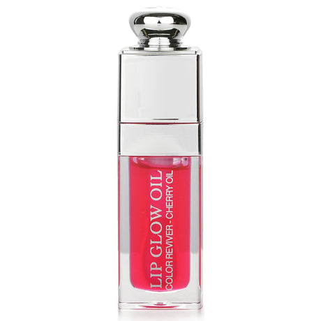 Christian Dior Dior Addict Lip Glow Oil in #015 Cherry, a nourishing, glossy lip oil with a non-sticky cherry infusion.