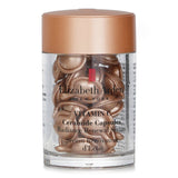 Luxurious single-dose capsules of Elizabeth Arden's Ceramide Vitamin C Serum for radiant, youthful skin rejuvenation.