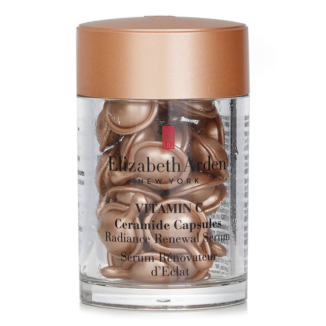 Luxurious single-dose capsules of Elizabeth Arden's Ceramide Vitamin C Serum for radiant, youthful skin rejuvenation.