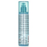 Thermal protecting spray by Rene Furterer, enriched with Jojoba and Vitamin B5 for heat protection and frizz control.