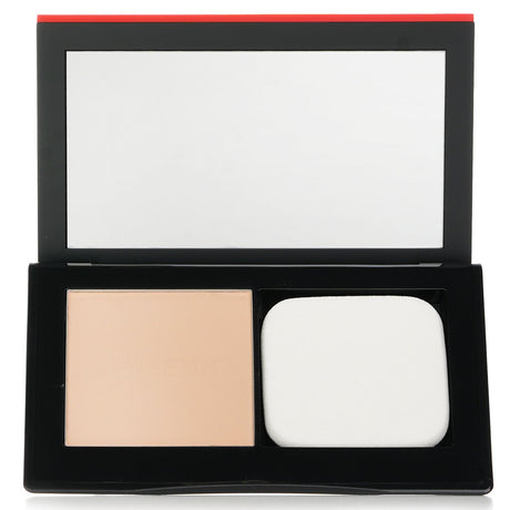 Shiseido Synchro Skin powder foundation #130 in Opal, offering weightless coverage and a skin-friendly formula.