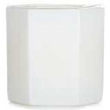 Luxurious hexagonal candle in soft white glass, featuring ocean and bergamot scents, burns for 60 hours, perfect for decor.