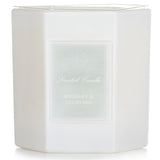 Elegant hexagonal candle in white glass, blending bergamot, ocean tones, and floral scents; 60-hour burn time.