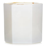 Luxurious hexagonal candle in soft white glass, infused with Damascena rose, orris, and oud, offering 60 hours of fragrance.