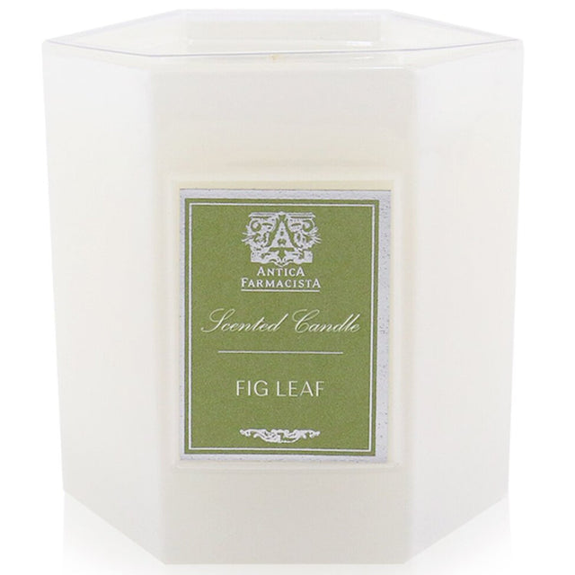 Antica Farmacista Fig Leaf Candle in a white glass holder, featuring a blend of fresh and earthy scents for 60 hours of ambiance.