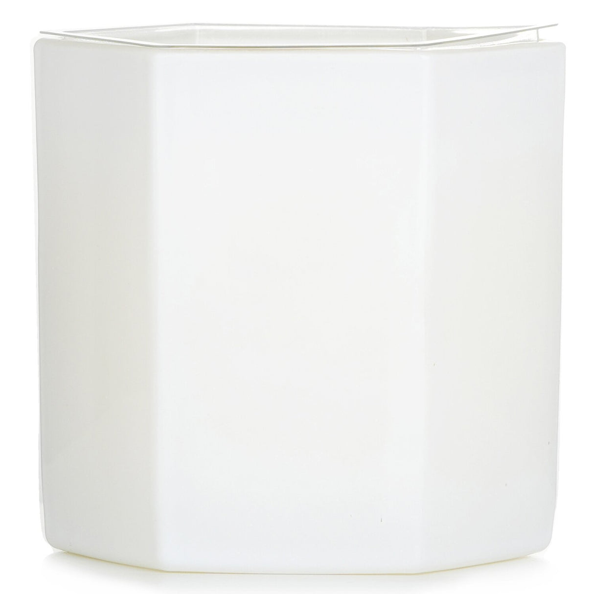 Hexagonal candle in soft white glass, blending lemon, verbena & cedar fragrances for a serene ambiance and 60-hour burn time.