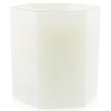 Luxurious Manhattan candle in a white glass container, offering 60 hours of vibrant fragrance with notes of satsuma and amber.