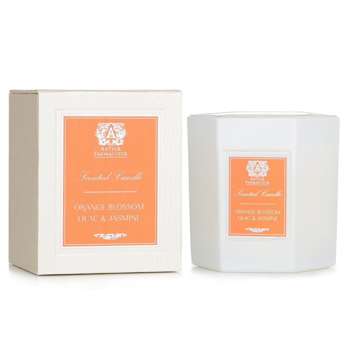 Luxurious Antica Farmacista candle featuring orange blossom, lilac & jasmine, housed in a soft white glass for a serene ambiance.