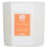 Luxurious 255g candle in white glass, featuring a citrus floral scent of orange blossom, lilac, and jasmine, for 60-hour burn.