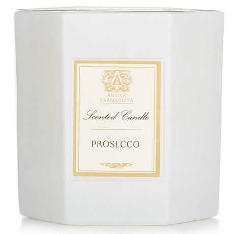 Luxurious Antica Farmacista Prosecco Candle in a soft white glass with fruity floral notes, perfect for creating an inviting ambiance.