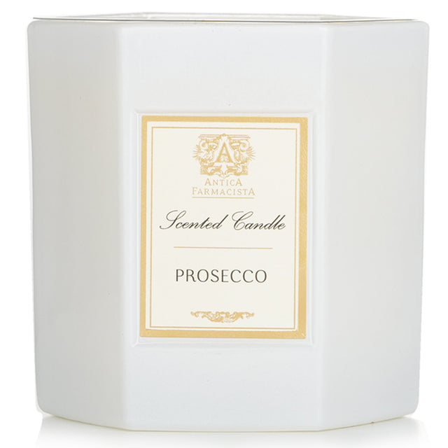 Luxurious Antica Farmacista Prosecco Candle in a soft white glass with fruity floral notes, perfect for creating an inviting ambiance.