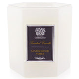Luxurious Sandalwood Amber candle in soft white glass, offering 60 hours of rich, complex fragrance for a warm atmosphere.