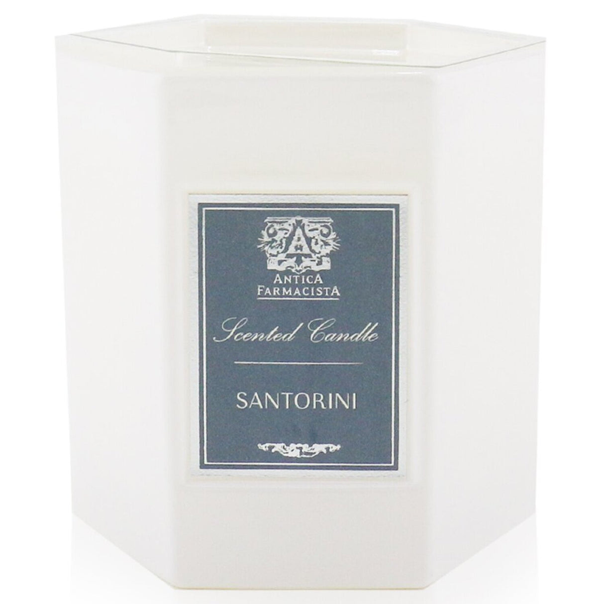 Elegant Santorini Candle in a soft white glass, blending vibrant citrus scents for a luxurious home ambiance.