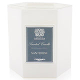 Elegant Santorini Candle in a soft white glass, blending vibrant citrus scents for a luxurious home ambiance.