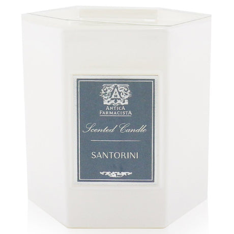 Elegant Santorini Candle in a soft white glass, blending vibrant citrus scents for a luxurious home ambiance.