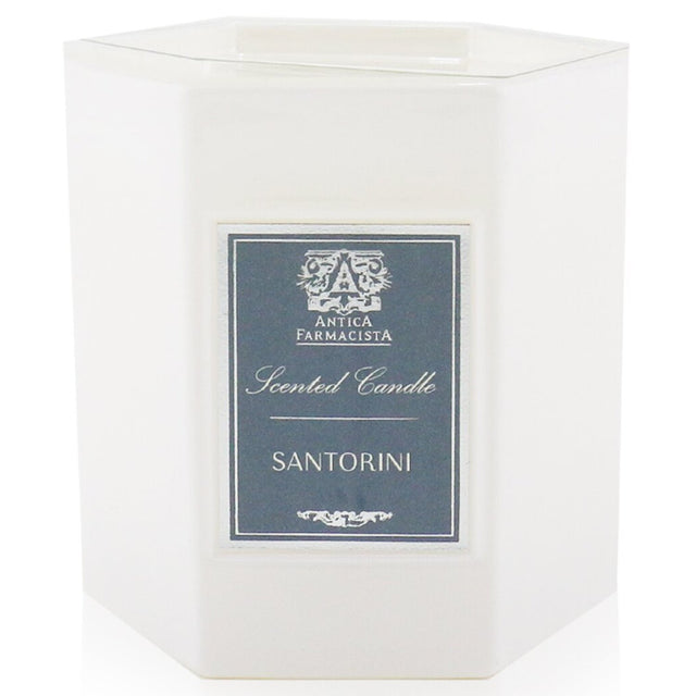 Elegant Santorini Candle in a soft white glass, blending vibrant citrus scents for a luxurious home ambiance.