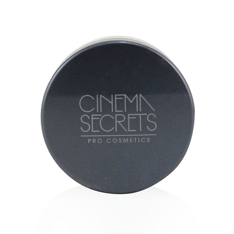 Cinema Secrets Ultralucent Illuminating Powder in #Candlelight, a vegan highlighting powder for a radiant, healthy glow.