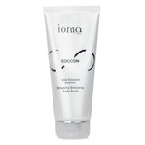 IOMA Cocoon Exfoliating Body Scrub in honey texture promotes soft, smooth skin with natural exfoliants for a radiant glow.