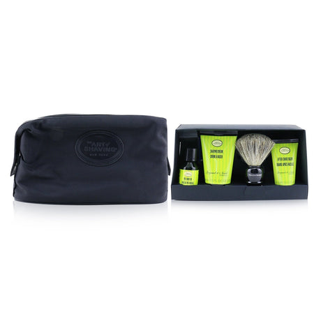 Luxurious shaving set with Bergamot & Neroli, includes pre-shave oil, shaving cream, balm, brush, and razor in a chic bag.