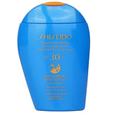 Lightweight Shiseido Expert Sun Protector SPF 30 lotion for face and body, turns invisible, water-resistant, and moisturizing.
