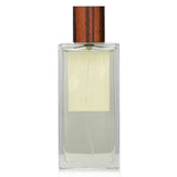 Loewe 001 Man Eau De Toilette Spray 100ml in a sleek bottle, featuring woody and spicy notes for modern gentlemen.