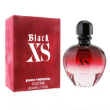 Paco Rabanne Black XS For Her Eau De Parfum, 80ml, features floral and woody notes, perfect for evening wear.