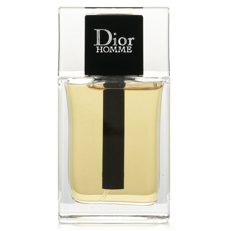 Christian Dior - Dior Homme Eau De Toilette Spray 50ml, an elegant woody fragrance for men with bergamot, cedar, and musk notes.