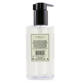 Luxurious Jo Malone Poppy & Barley Body & Hand Wash with pump, 250ml, transforms into a rich, fragrant lather for soft skin.