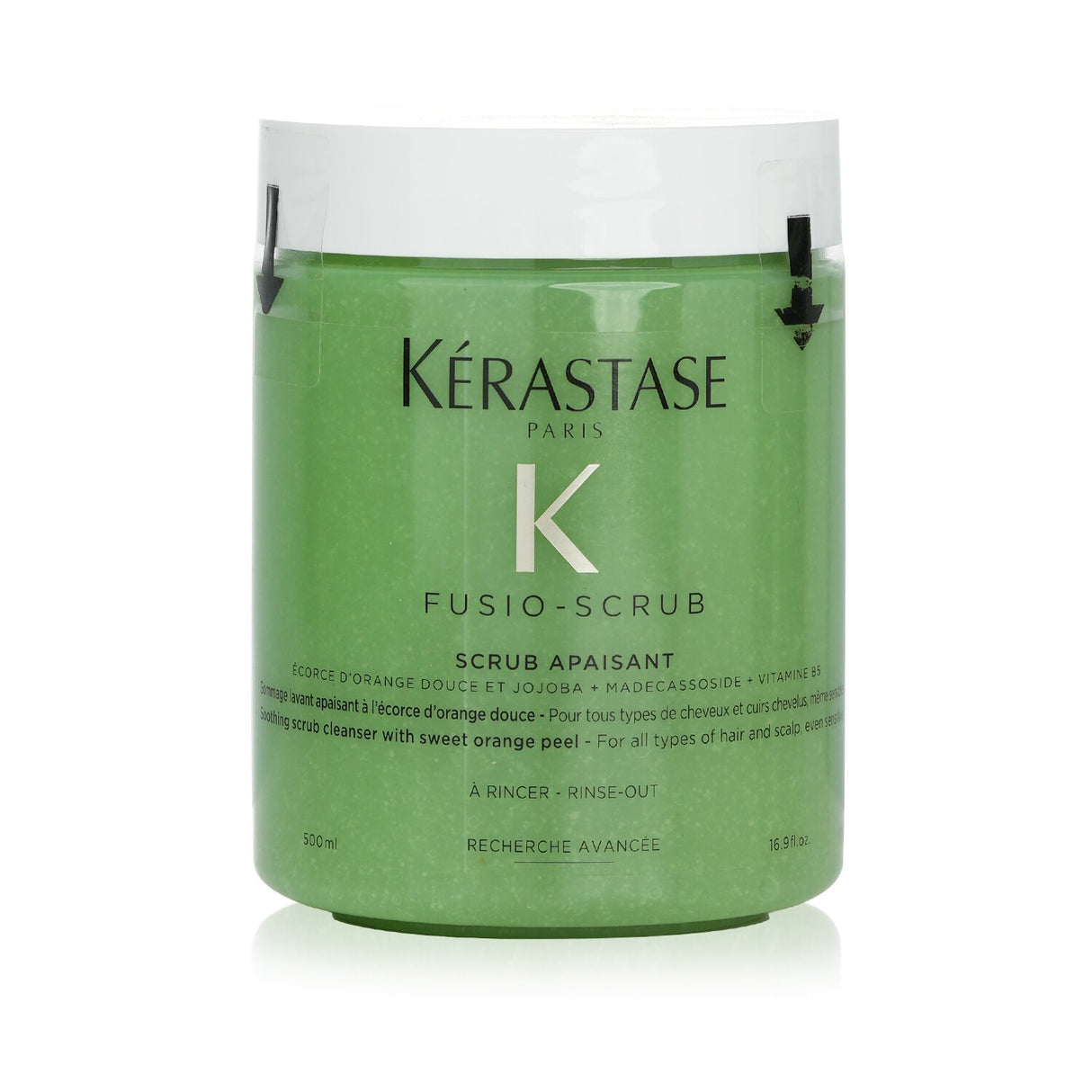 Kerastase Fusio-Scrub: Soothing orange scrub for all hair types, combats dryness and flakiness while enhancing shine.