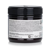 Davines Alchemic Creative Conditioner #Teal for blonde hair, featuring nourishing Jojoba Oil for vibrant color and shine.