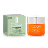 Clinique Superdefense SPF 25 cream combats fatigue and aging for combination oily skin with antioxidants and hydration.