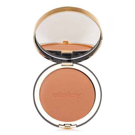 Sisley Phyto Poudre Compacte #4 Bronze pressed powder with creamy texture for a flawless, radiant finish and skin hydration.